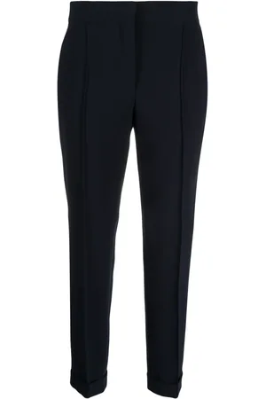 Moschino Pressed-crease concealed-fastening tapered trousers