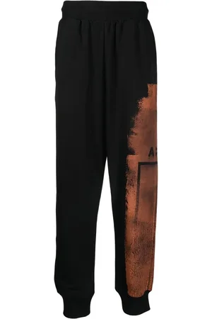 A-cold-wall* Logo bleach style track pants
