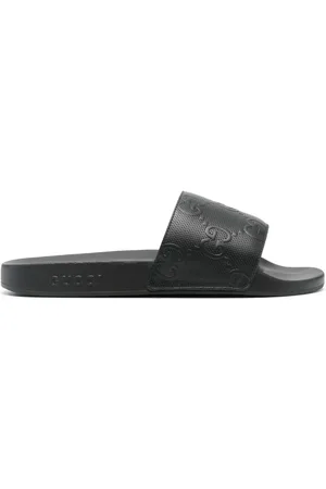 Gucci GG-embossed slides