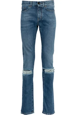 Saint Laurent Ripped-detail slim-fit jeans