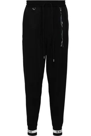 MASTERMIND Logo print track pants