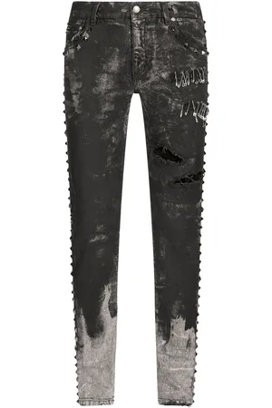 Dolce & Gabbana Distressed studded slim-fit jeans