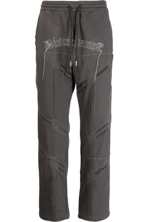 Children Of The Discordance Logo-embroidered distressed track pant
