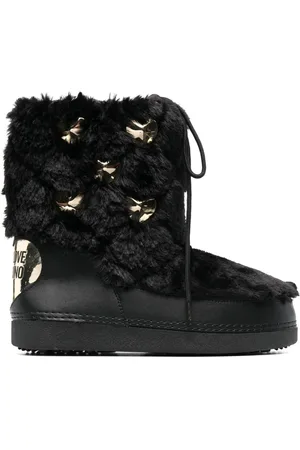 Moschino Studded faux-fur boots