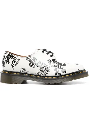 Comme des Garçons X Dr. Martens text-print Derby shoes