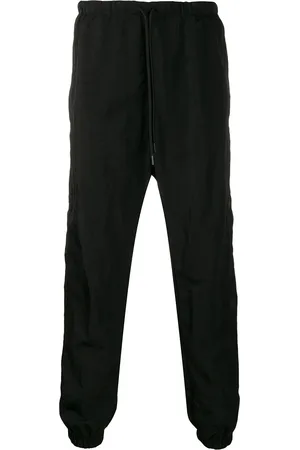 MARCELO BURLON Cross track pants