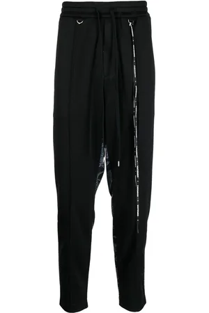 MASTERMIND Camouflage-print track pants