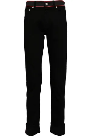 Alexander McQueen Contrasting waistband slim-fit jeans