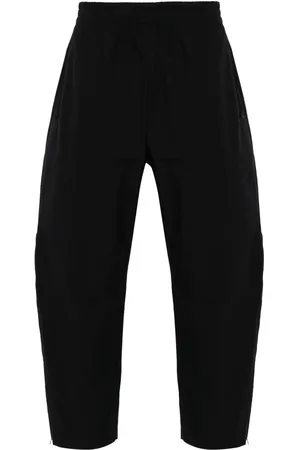 STUDIO NICHOLSON Opal tapered-leg trousers