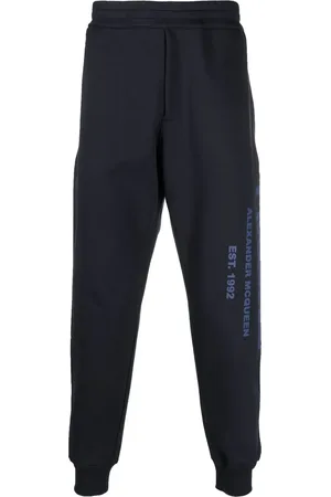 Alexander McQueen Graffiti-print cotton track pants