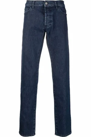 MARCELO BURLON Tempera logo-print jeans