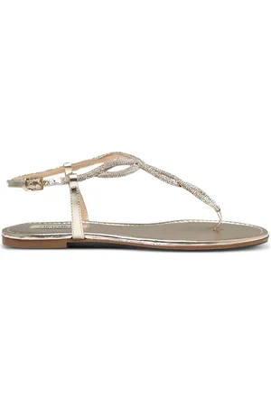 NINALILOU Embellished knotted flat sandals