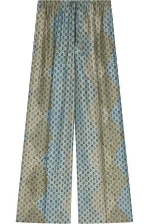 DRIES VAN NOTEN Geometric-pattern elasticated trousers