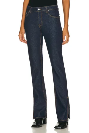 GRLFRND Hailey Low Rise Slim Boot With Slit Hem in Denim-Dark