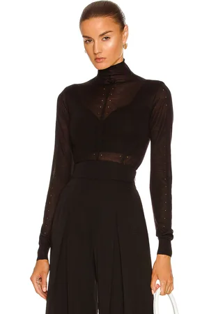 Alaïa Long Sleeve Roll Neck Sweater in Black