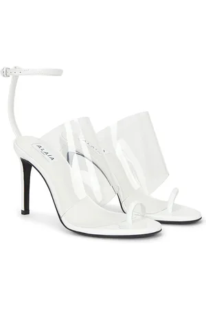 Alaïa Asymmetric Sandal in White