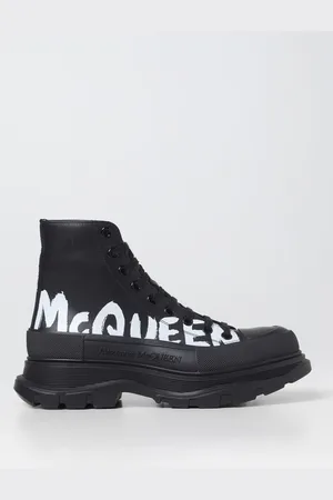 Alexander McQueen Tread Slick leather boots with printed logo