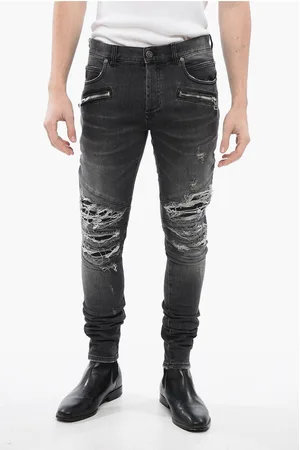 Balmain Multipocketed Distressed Denims with Leather Biker Inserts 1