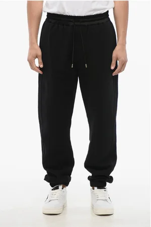Saint Laurent Cuffed Fleeced Cotton Sweatpants with Nylon Detail