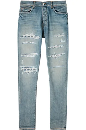 AMIRI Quad Repaired Distressed Skinny Jeans - - 32 (W32 / M)