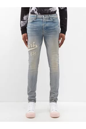 AMIRI Men Slim Jeans - Varsity Appliqué Slim-leg Jeans - Mens - Blue