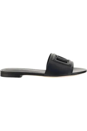 Dolce & Gabbana Sliders, female, , Size: 7 US Embossed Logo Sandals with Flat Sole