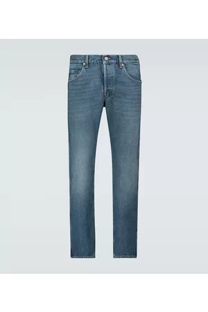 Gucci Washed denim tapered jeans