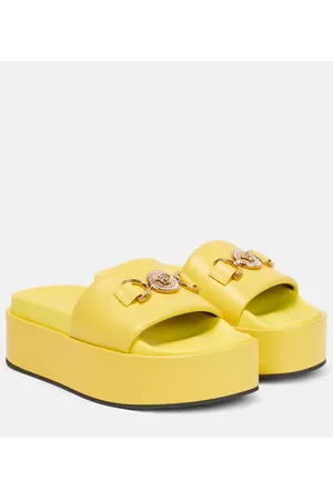 Medusa Aevitas embellished platform pumps in yellow - Versace