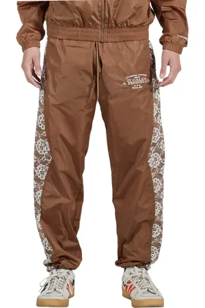 Pleasures Francesca Floral Lace Nylon Track Pants in at Nordstrom, Size Small