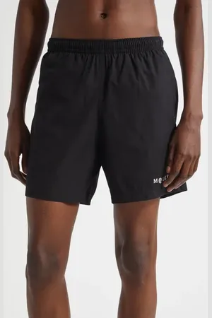 Alexander McQueen Embroidered Logo Swim Trunks in at Nordstrom, Size Small