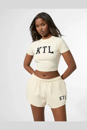 Public Desire Kaiia KTL Logo Baby Tee Buttercream
