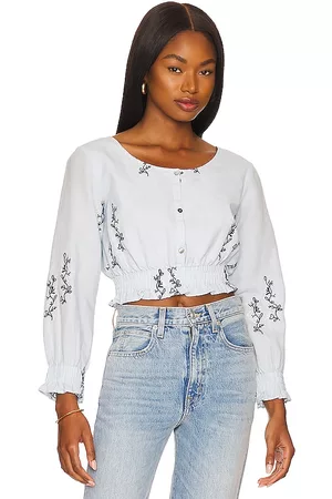Something Navy Cropped Embroidered Long Sleeve Top in Baby .