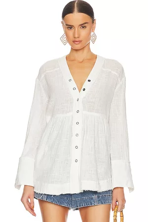 Free People Miles Away Babydoll Top in White.