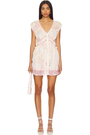 Free People Spring Fling Mini Dress in Blush. - size M (also in S)