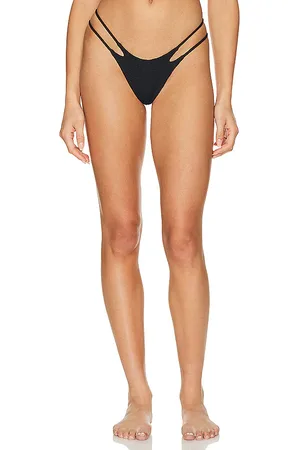 Indah Jovi Skimpy Solid Smocked String Bikini Bottom in . - size M (also in L, S)