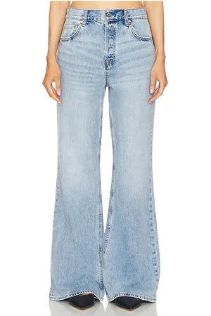 GRLFRND X Maggie MacDonald Jade Low Rise Relaxed Flare in Denim-Light. - size 24 (also in 26, 27, 30, 31, 32)