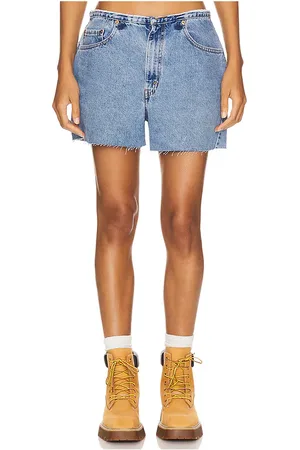aligrace Undone Mini Rise Short in Denim-Medium. - size 24 (also in 33, 34)