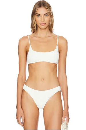 Solid X REVOLVE The Rachel Smocked Bikini Top in Ivory. - size M (also in XL)