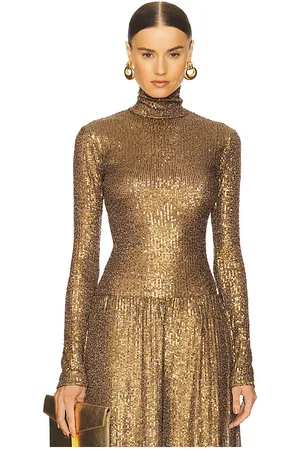 Norma Kamali Slim Fit Long Sleeve Turtleneck Top in Metallic Gold. - size M (also in S)