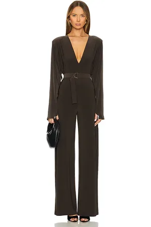 Norma Kamali Dolman V Neck Jumpsuit With Shoulder Pads in Brown. - size L (also in M, S, XL, XS, XXS)
