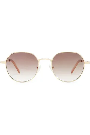 Le Specs Odyssey Sunglasses in Metallic Gold.