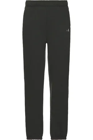 alo Accolade Sweatpant in Dark Green. - size L (also in M, S, XL/1X)