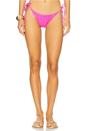 Luli Fama Seamless Ruched Back Brazilian Tie Side Bottom in . - size L (also in M, S, XS)