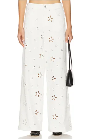 For Love & Lemons Daisy Eyelet Baggy Jean in . - size L (also in M, S, XS)