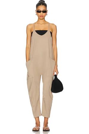 Free People X FP Movement Hot Shot Onesie in Tan. - size L (also in M, S, XL)