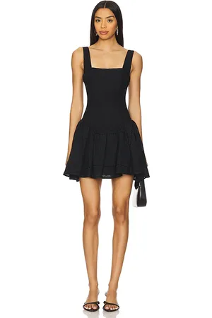 WeWoreWhat Corset Peplum Mini Dress in Black. - size 0 (also in 00, 10, 12, 14, 2, 4, 6, 8)