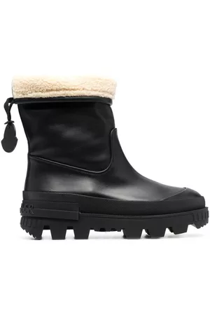 Moncler Ankle Boots - Embossed-logo ankle boots - 36