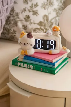 https://images.fashiola.com/product-list/300x450/urban-outfitters/553779742/cat-plushie-clock-in-assorted-at-urban-outfitters.webp