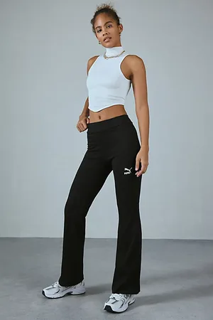 PUMA Classics Ribbed Knit Flare Pant in Black, Women