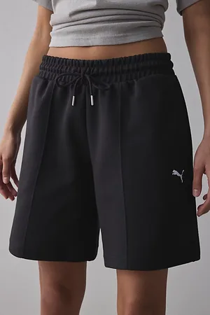 PUMA Relaxed Longline Sweat Short in Black, Women
